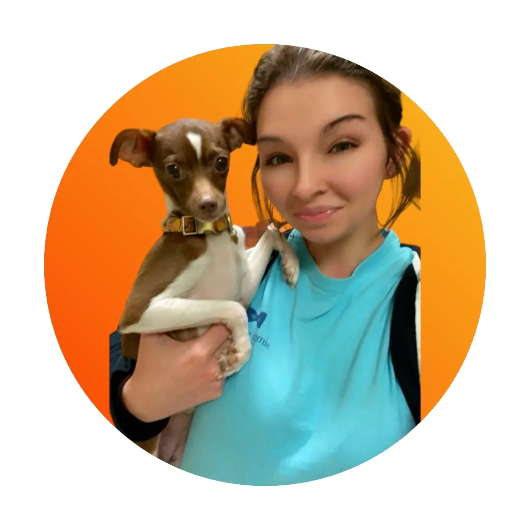 Bri holding her dog